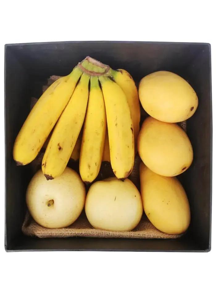 Tropical fruit basket delivery Manila with mangoes pears bananas in yellow gift box